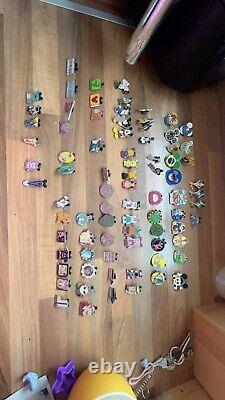 75 Disney Collectable hidden Micky Trading pins. Used condition