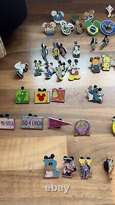 75 Disney Collectable hidden Micky Trading pins. Used condition