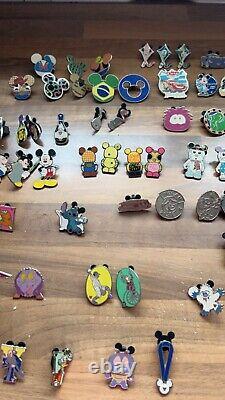 75 Disney Collectable hidden Micky Trading pins. Used condition