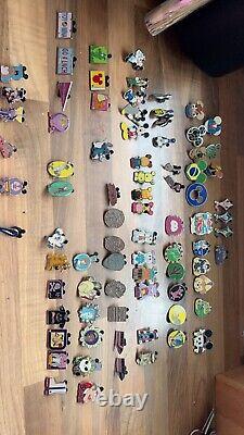 75 Disney Collectable hidden Micky Trading pins. Used condition