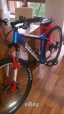 Limited edition carrera bike red, whit and blue excellent condition