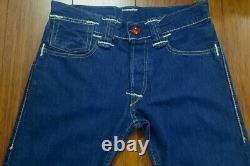 Collection rare de jeans Levi's Red Limited Edition bleu, taille W30 L34, en parfait état.