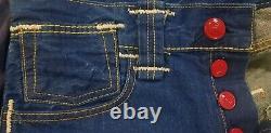 Collection rare de jeans Levi's Red Limited Edition bleu, taille W30 L34, en parfait état.