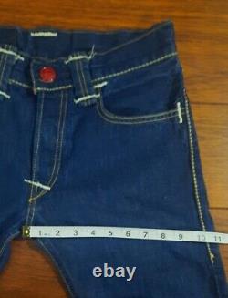 Collection rare de jeans Levi's Red Limited Edition bleu, taille W30 L34, en parfait état.