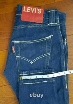 Collection rare de jeans Levi's Red Limited Edition bleu, taille W30 L34, en parfait état.