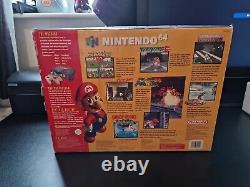 Console Nintendo N64 en édition limitée avec manette dorée, boîte d'origine en excellent état