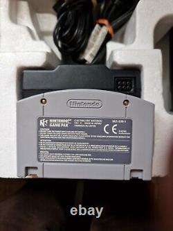 Console Nintendo N64 en édition limitée avec manette dorée, boîte d'origine en excellent état