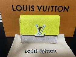 Édition limitée Louis Vuitton Portefeuille Capucines XS 3 plis en bon état