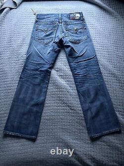 Jeans True Religion déchirés édition limitée 34 en condition immaculée