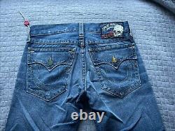 Jeans True Religion déchirés édition limitée 34 en condition immaculée